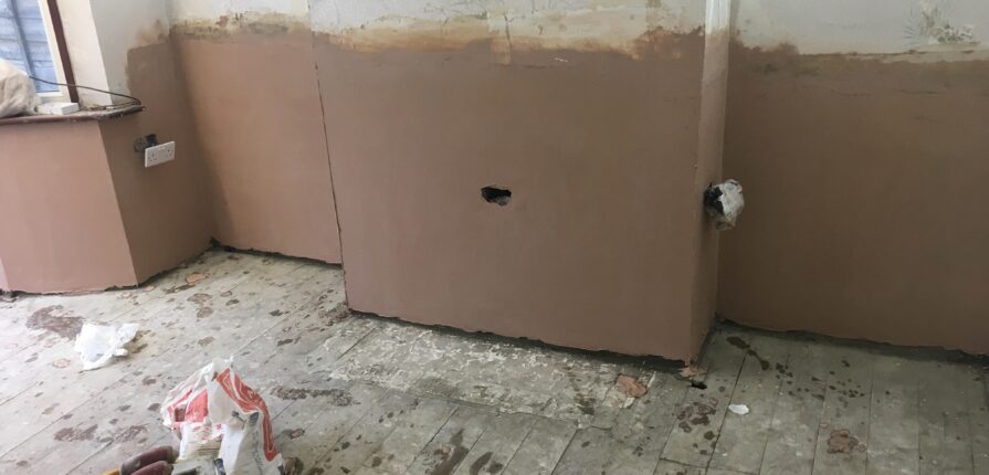 Damp mould plaster wall