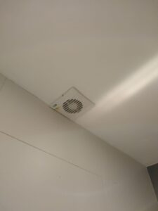 Bathroom extract fan preventing moisture migration.